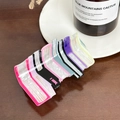 Colorful book-shaped hair claw clip with pearlescent finish in stacked book design - Pink Book Stack Claw