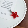 Fermaglio per capelli a stella in acetato rosso con strass colorati su piatto bianco - Fermaglio (4.3cm) / Rosso
