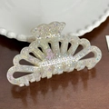 Elegant semi-transparent cream shark clip with iridescent rhinestones in fan-shaped resin - Iridescent White