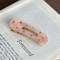 Fermaglio per capelli in acrilico rosa marmorizzato con strass colorati e base dorata - Rosa Pesca