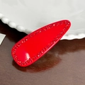 Vibrant red teardrop hair clip with matching rhinestones and glossy finish - Spring Clips / Red
