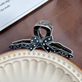 Polka dot bow hair claw clip in black and white finish for elegant hair styling - 11.2cm / White Polka Dot Medium