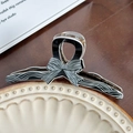 Elegant black and white wave pattern bow hair claw clip on a vintage ceramic plate - 12.8cm / White Fine Lines Large