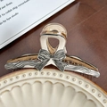 Polka dot bow-shaped hair claw clip in beige and amber finish with black hand-drawn lines - Black Fine Lines Large