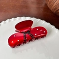 Translucent red acetate hair claw clip with rhinestones and black bow patterns - Hair Claw / Red