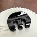 Glossy black heart-shaped hair claw clip on white porcelain plate and wooden desk - M Shape-Black-7.9cm