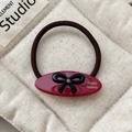 Elegante elastico per capelli ovale rosso con fiocco nero e strass dorati decorativi - Piccolo / Rosso