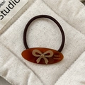 Elastico per capelli in acetato marrone con fiocco di strass e logo France Handmade - Piccolo / Marrone