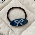 Elastico per capelli marrone scuro con charm in acrilico blu e fiocco con strass azzurro - Piccolo / Blu