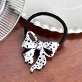 Chic acetate hair tie with dalmatian spotted bow design on a black elastic band - Black Polka Dot Hair Tie