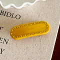 Eleganter gelber Acetat-Haarclip mit funkelnden Strasssteinen im luxuriösen Oval-Design - Gelb