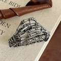 Gothic skull hand hair claw clip in metallic gunmetal finish for creative hair styling - Black Skeleton Hand Claw