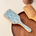 Light blue marble texture acetate inlay on natural wooden massage hairbrush handle - 25cm / Blue