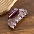 Large marbled purple hair claw clip with burgundy accent on a wooden tray - 10.7CM / Red