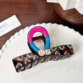 Pince à cheveux en acétate marron avec motifs colorés, smiley rose et cristal brillant - Style Visage Souriant (10.5cm)