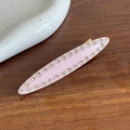 Pince à cheveux rose avec strass et forme de feuille élégante sur table en bois - Rose Clair