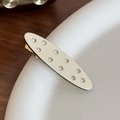 Elegante molletta per capelli in acetato crema con strass e base in metallo dorato - Bianco
