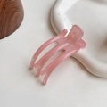 Pink translucent jelly hair claw clip with three teeth on white ceramic tray - 8cm / Pink