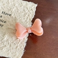 Barrette à cheveux rose pailletée en forme de nœud avec finition brillante élégante - Barrette Orange Clair