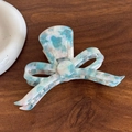 Elegante pinza para el pelo con lazo de acetato jaspeado azul y rosa y letras oro - Azul Gelatina