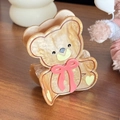 Pinza para el pelo de oso en acrílico ámbar con detalle de lazo rojo - 8.3cm / Café Claro