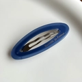 Barrette ovale en acétate bleu marine avec lettrage doré et pince métallique - Style Creux Oval / Bleu