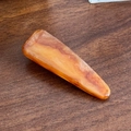 Triangle acetate hair clip featuring a marbled orange and cream pattern on wood - 5.6cm / Brown
