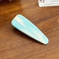 Elegant triangular acetate hair clip featuring light blue and white marble pattern texture - 5.6cm / Blue
