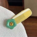 Cute resin flower hair clip with yellow and cream base and green rhinestone floral detail - Yellow with Green Flower