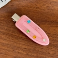 Pink acetate hair clip featuring colorful rhinestones on a silver metal spring base - Pink