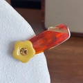 Amber resin flower hair clip with yellow rhinestone accents and geometric patterns - Coffee with Yellow Flower