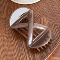 Sleek caramel brown translucent cross-designed hair claw clip with glossy resin finish - 8.5cm / Brown