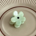 Mini pinza de pelo de flor verde gelatina con centro negro en plato decorativo - Verde (2.8cm)