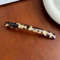 Elegant tortoise shell patterned acetate spring hair barrette on a wooden background - 10.6cm / Beige Coffee