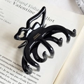 Elegant large black butterfly hair claw clip with glossy finish and gold branding - Black With Gold Label
