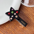 Pince à cheveux étoile noire avec strass colorés et finition en acétate pour femme - Noir / 5,5 cm