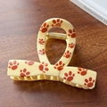Medium beige shark hair claw with orange cat paw prints and gold spring detail - Yellow Bow Style