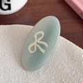 Minzgrüne ovale Haarspange mit weißem Schleifenmuster und glänzendem Harz-Finish - Oval Blau-4.6cm
