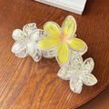 Detail of yellow flower hair claw clip with transparent petals on dark wooden background - Yellow Floral 11cm