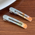 Vintage-Entenschnabel-Haarspange aus Acetat mit marmoriertem Blau-Orange-Muster - Blau Orange