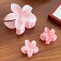 Pink and white marble resin floral hair claw clip set with frangipani flower design - One Large And Two Small / Pink Set