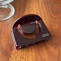 Elegante pinza per capelli in acetato rosso vino con scritta dorata France Handmade - Caffè Con Logo Dorato