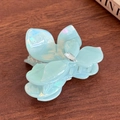 Iridescent light blue floral hair claw with central teardrop rhinestone and pearl finish - Small / Iridescent Cyan