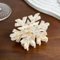 Detail of snowflake hair claw in cream acetate with marble texture and small crystals - Orange White Snowflake