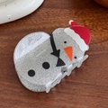 Cute Christmas snowman hair claw clip with silver glitter finish and festive red hat - Snowman