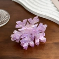 Detailed view of purple snowflake hair claw clip with shimmering rhinestones and acetate - Translucent Purple Snowflake