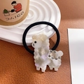 Close-up of a cute alpaca resin charm with rhinestones on a black elastic hair tie - Hair Tie / Iridescent Gray