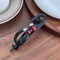 Elegant black infinity hair clip with red cherry beads and crystal rhinestone leaves - Black Twist Clip
