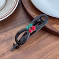 Vintage style black resin infinity hair clip featuring red cherry crystal leaf design - Coffee Twist Clip