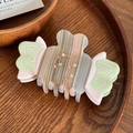 Elegante pinza per capelli in acetato a forma di caramella con strass e strisce beige - Caramella